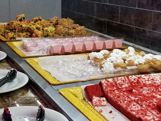 Cakes and sweets on the dessert bar